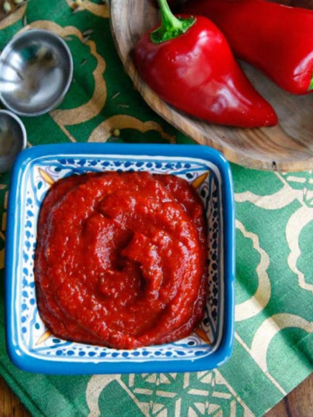 North African Harissa paste brings a smoky, spicy kick to this flavorful sheet-pan wonder.