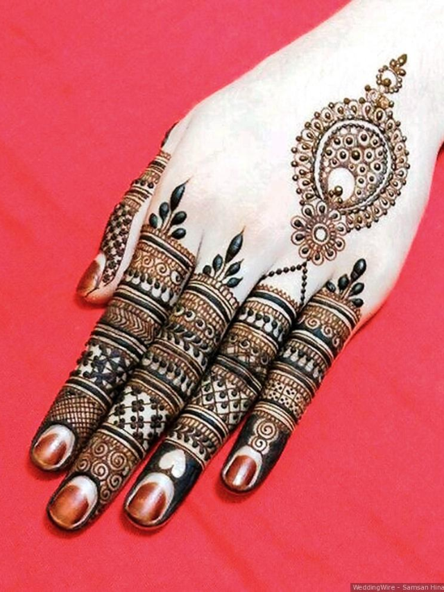 Don't shy away from filling your long fingers with intricate designs! This full-finger mehndi design is perfect for those who want a bold and statement-making look.