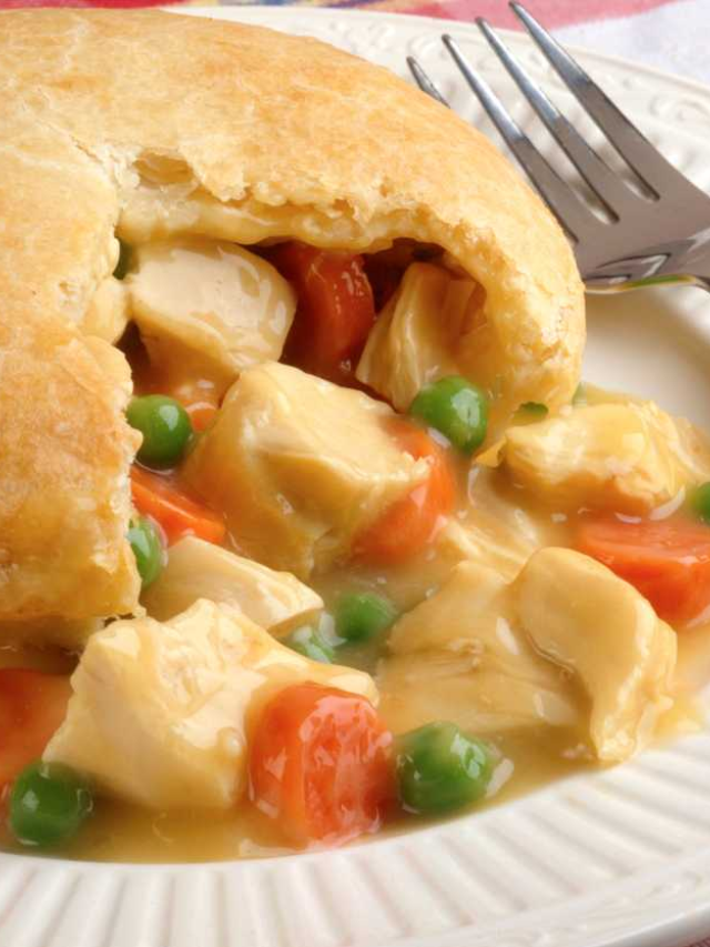 Warm up with this hearty and satisfying chicken pot pie bursting with tender chicken and vegetables.