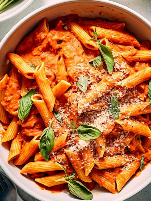 A pot of creamy tomato pasta with shrimp
