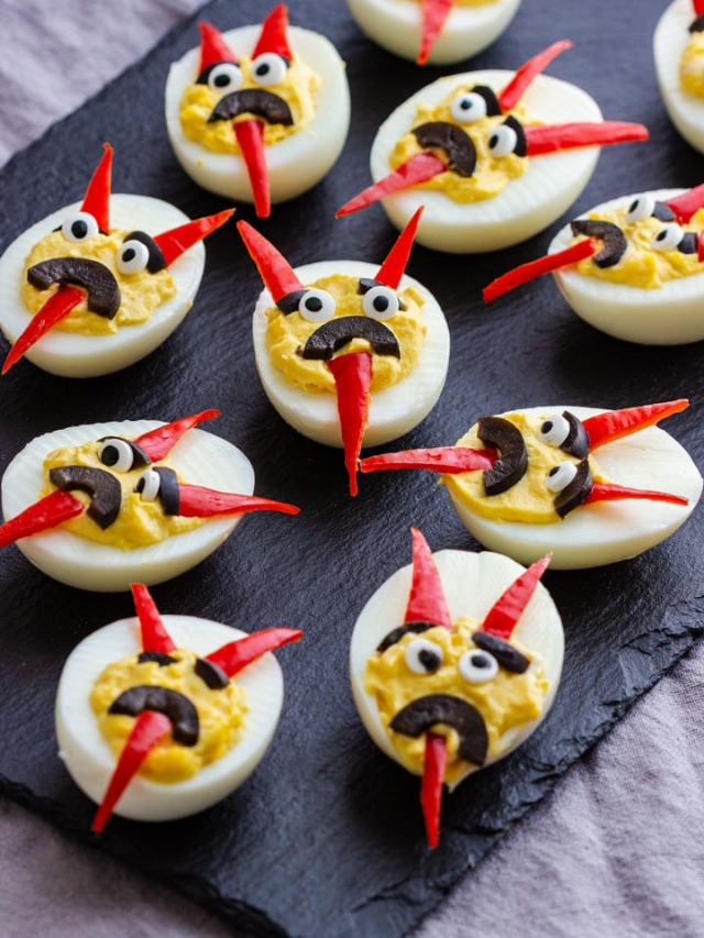 Spider Deviled Eggs - Deviled eggs decorated with olives for spiders.
