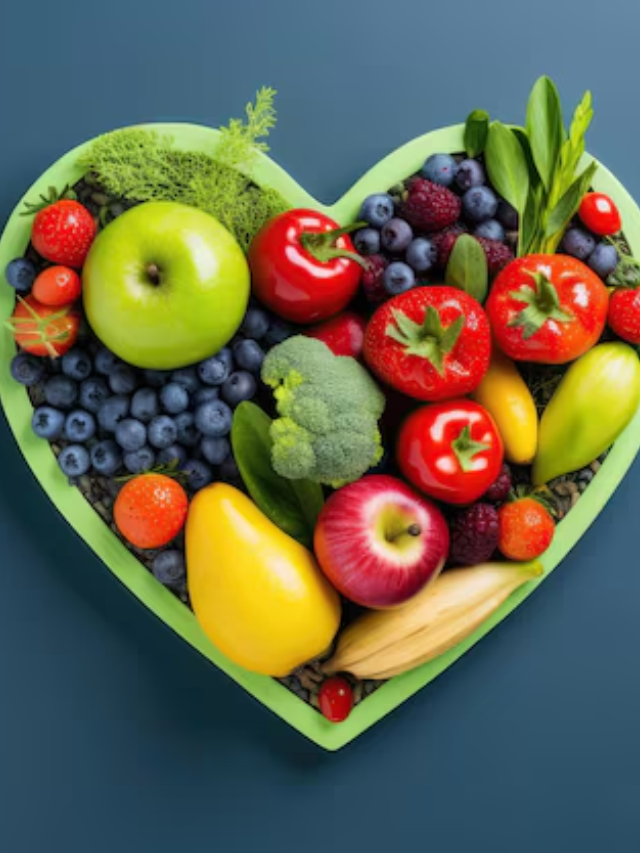 A person smiling and enjoying a healthy and colorful dinner plate.
