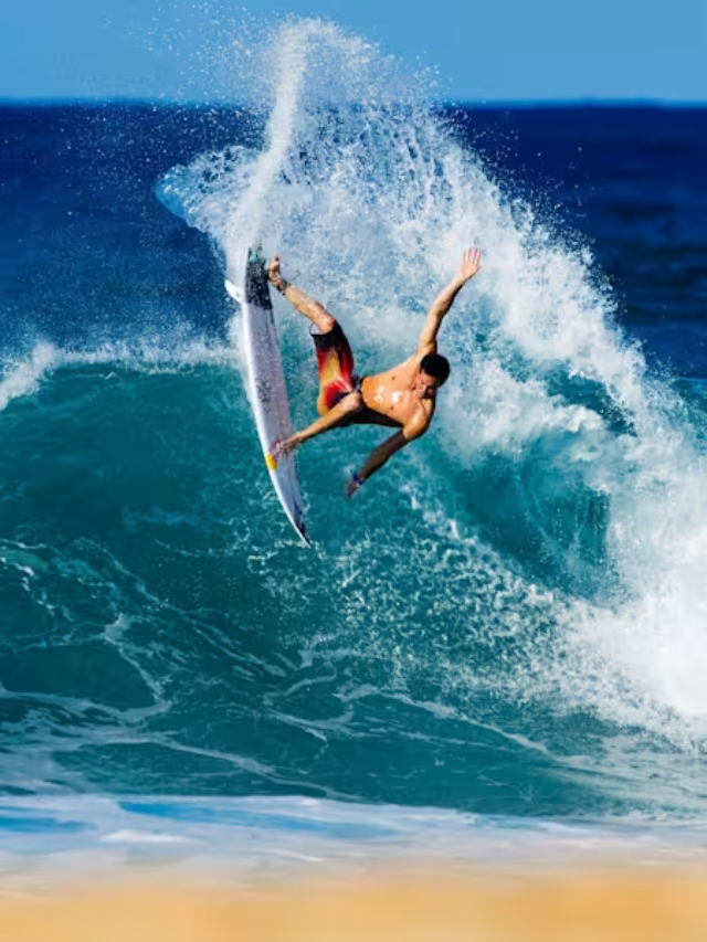 A surfer riding a giant wave on the North Shore of Oahu.
