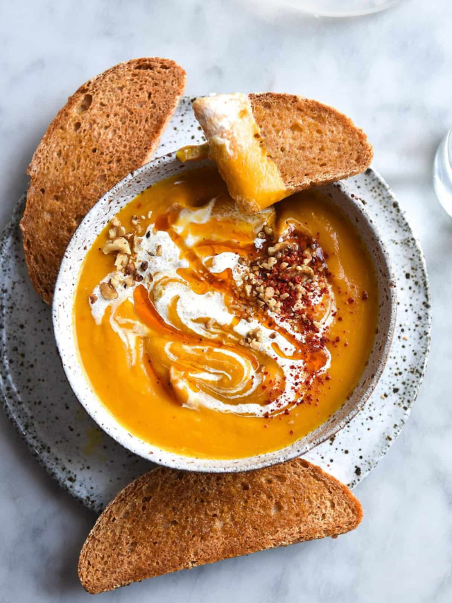  A steaming bowl of lentil soup with a crusty whole-wheat bread on the side.

