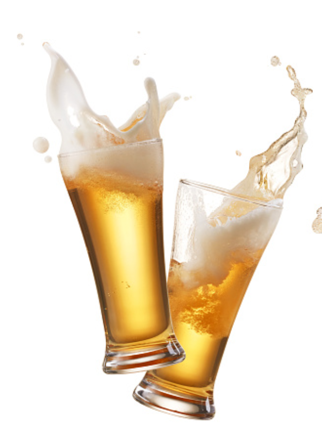 Close-up shot of craft beer being poured into a glass.
