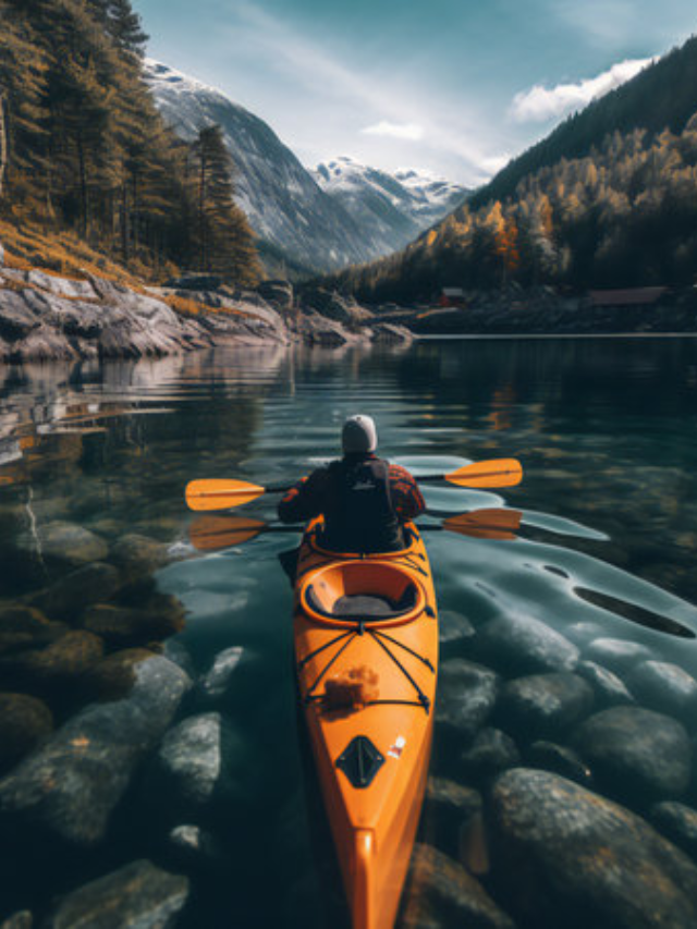  Person kayaking on a calm lake with trees in the background.
