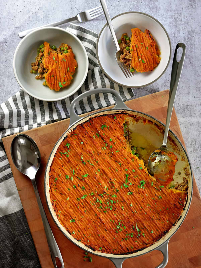 A photo of a shepherd's pie casserole with a golden brown mashed potato topping.
