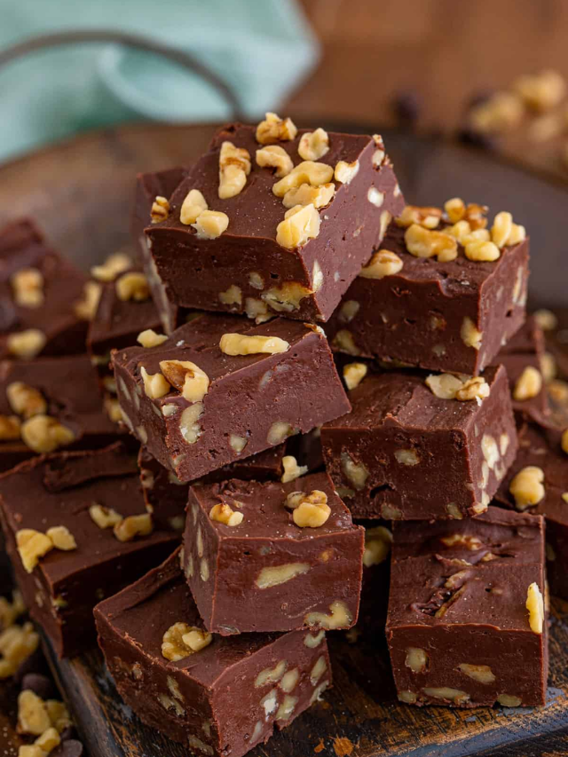 Close-up shot of a delectable fudge slice, with rich chocolate and nuts.
