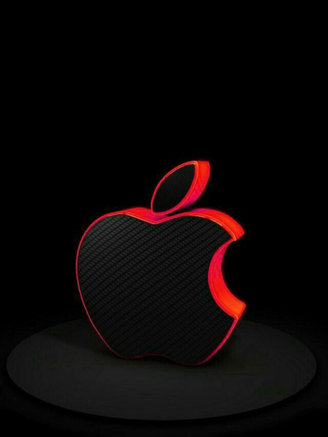 Silhouette of an iPhone 16 with a glowing Apple logo.
