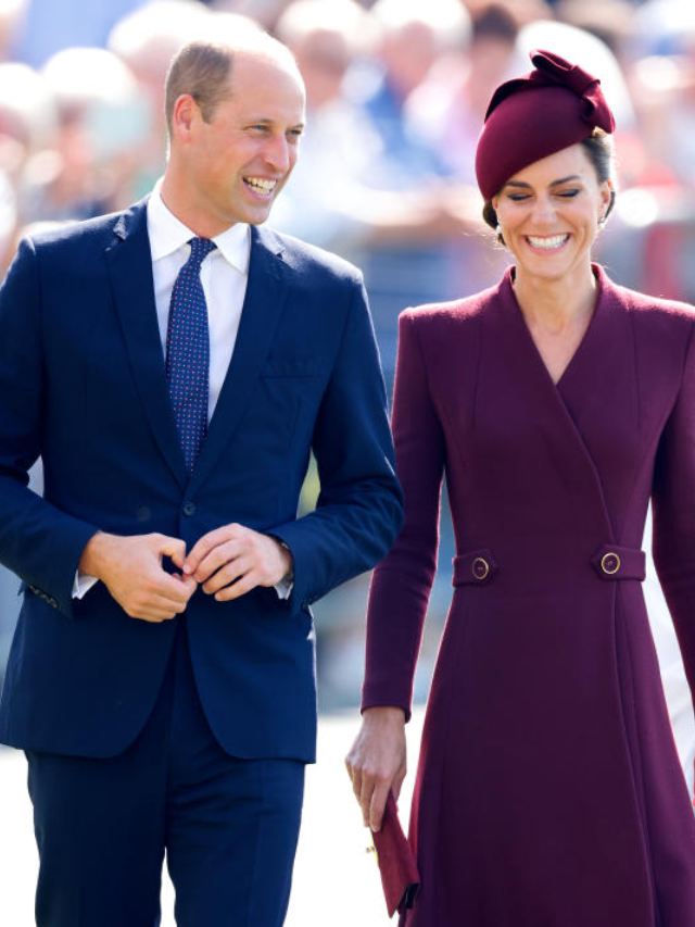 A close-up of Kate Middleton's face, focusing on her expression and the feather hat.
