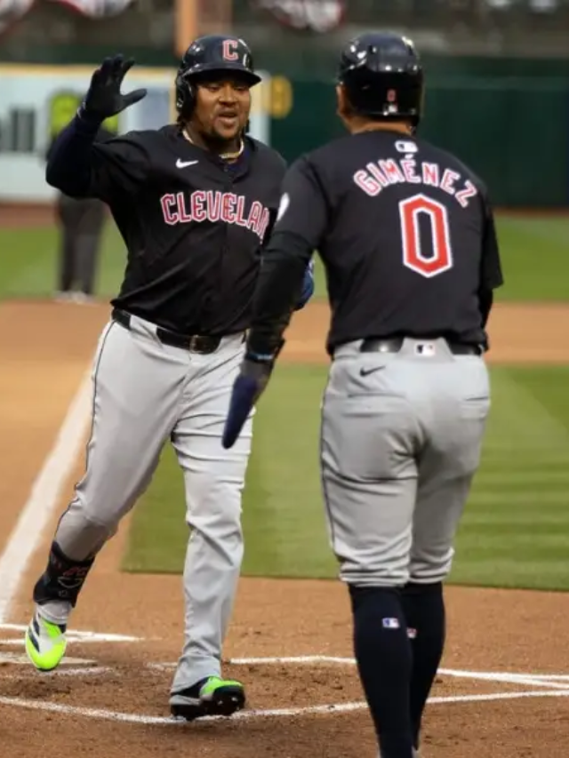 Detail the Guardians' six-run rally in the 12th inning, focusing on key hits and contributions.
