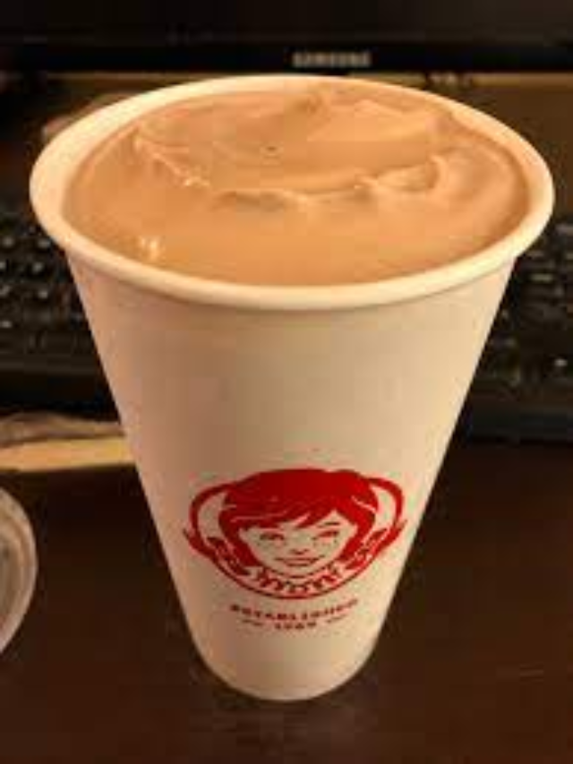 A photo showcasing both the Classic Chocolate and Triple Berry Frosty side-by-side.
